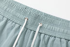 AMRI Starburst logo shell swim shorts